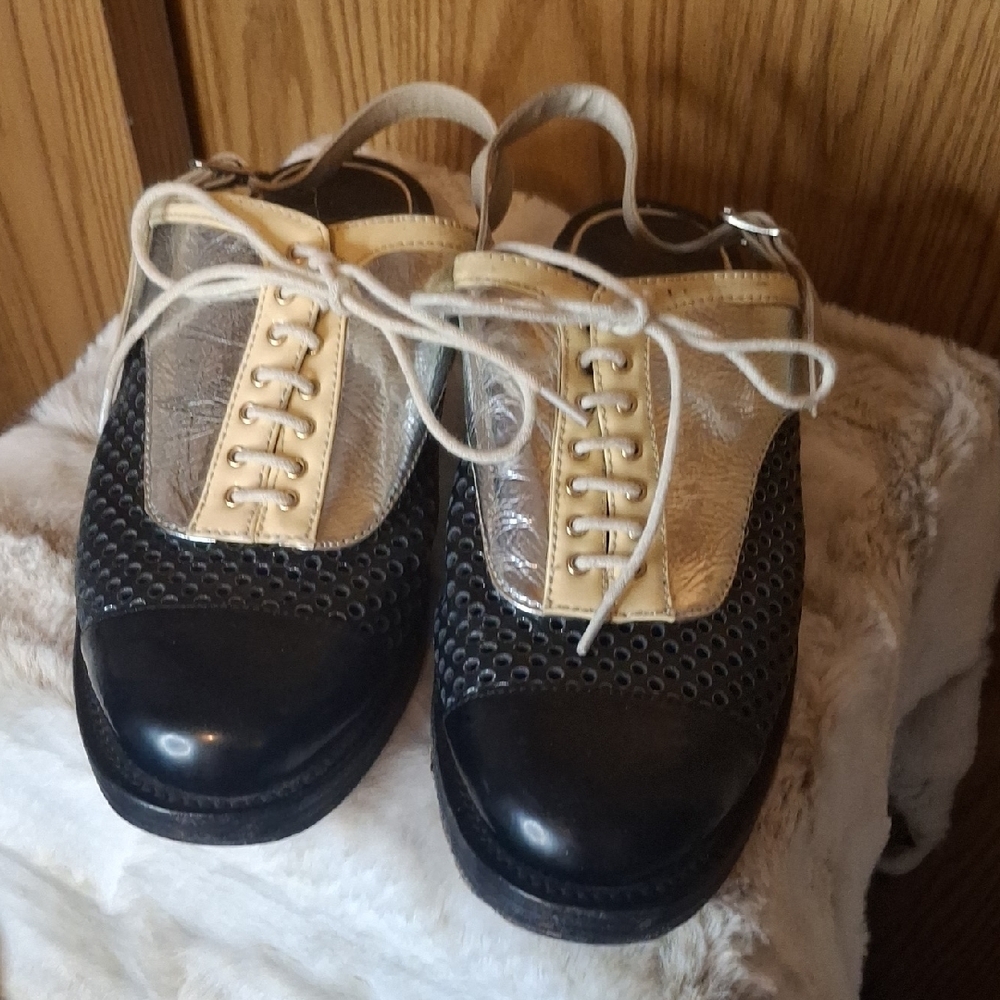 CHANEL Black, Cream, and Silver Lace-Up Loafers